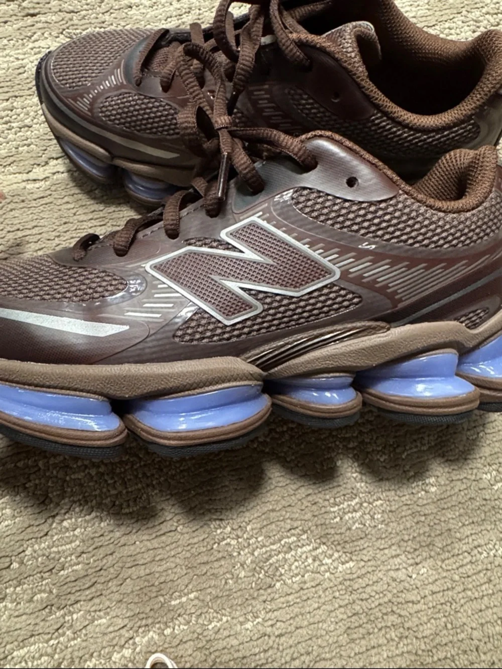 New Balance Women's Brown Athletic Shoes with Light Blue Cushioning